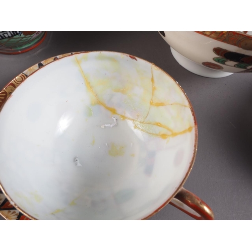 31 - A 1920s Japanese eggshell part teaset (damages)