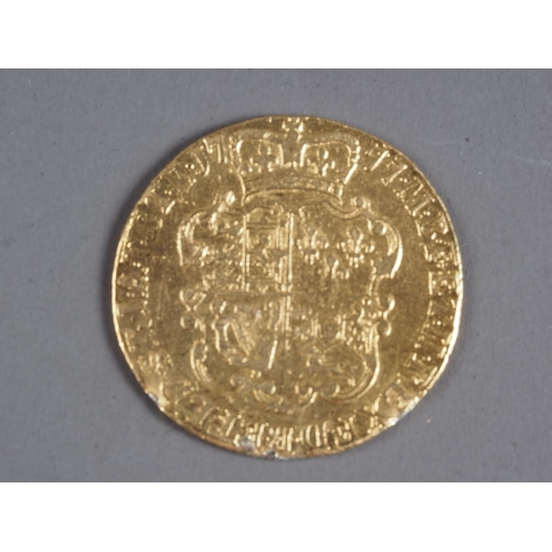 346 - A gold guinea, dated 1777