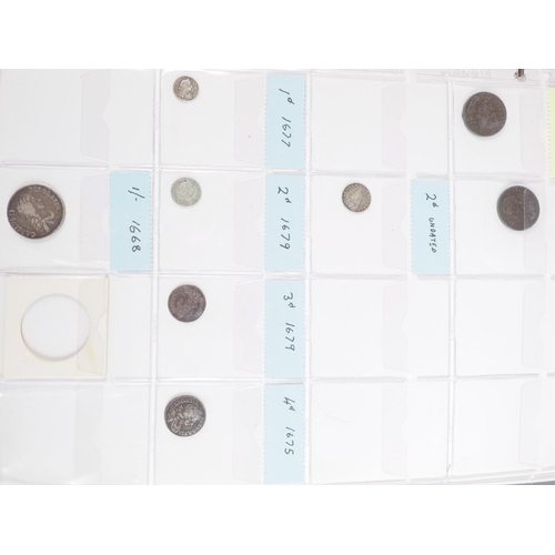 359 - Two albums of British silver and other coinage from King Charles II to the present day