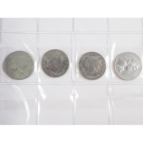 359 - Two albums of British silver and other coinage from King Charles II to the present day