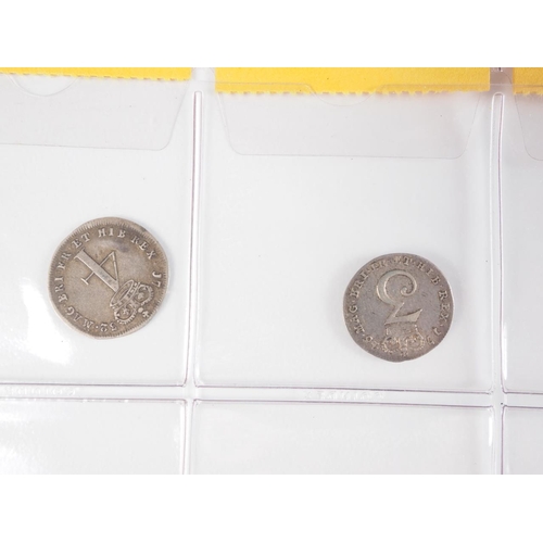 359 - Two albums of British silver and other coinage from King Charles II to the present day