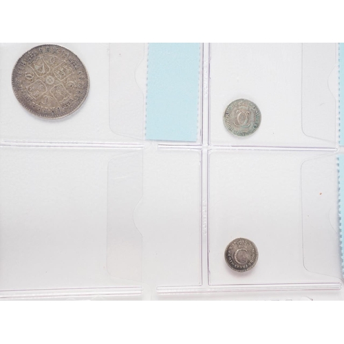 359 - Two albums of British silver and other coinage from King Charles II to the present day