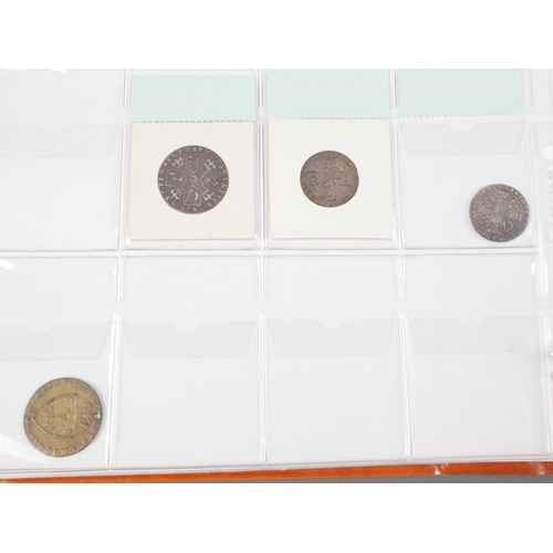 359 - Two albums of British silver and other coinage from King Charles II to the present day