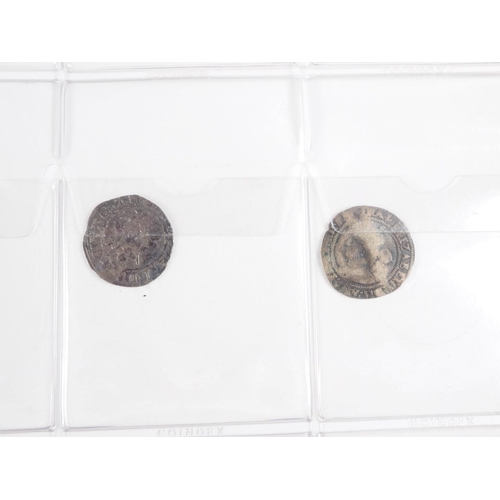 359 - Two albums of British silver and other coinage from King Charles II to the present day