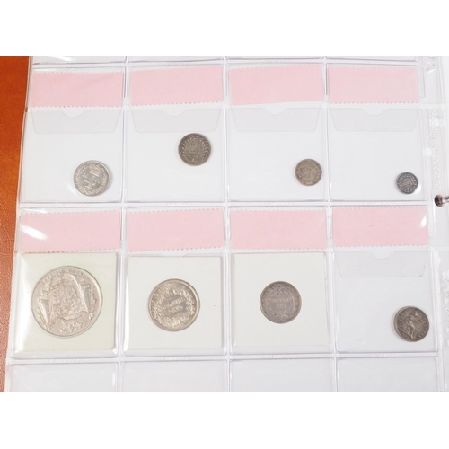 359 - Two albums of British silver and other coinage from King Charles II to the present day