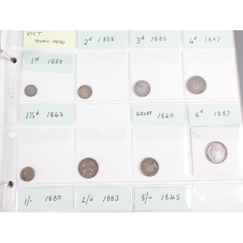 359 - Two albums of British silver and other coinage from King Charles II to the present day