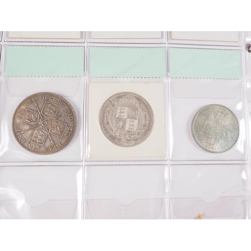 359 - Two albums of British silver and other coinage from King Charles II to the present day