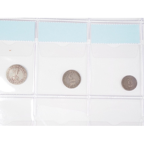 359 - Two albums of British silver and other coinage from King Charles II to the present day