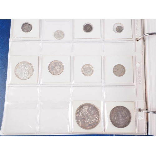 359 - Two albums of British silver and other coinage from King Charles II to the present day