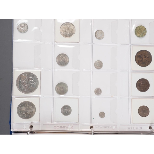 359 - Two albums of British silver and other coinage from King Charles II to the present day