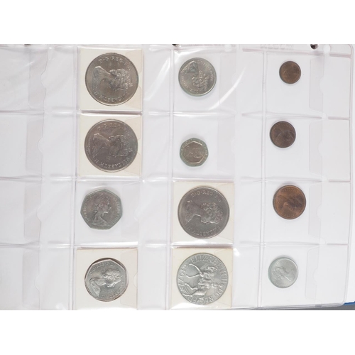 359 - Two albums of British silver and other coinage from King Charles II to the present day