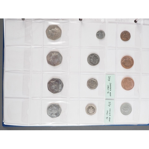 359 - Two albums of British silver and other coinage from King Charles II to the present day