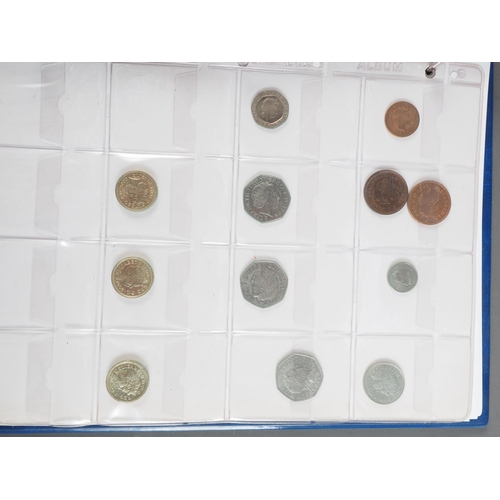 359 - Two albums of British silver and other coinage from King Charles II to the present day