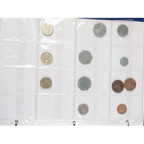 359 - Two albums of British silver and other coinage from King Charles II to the present day