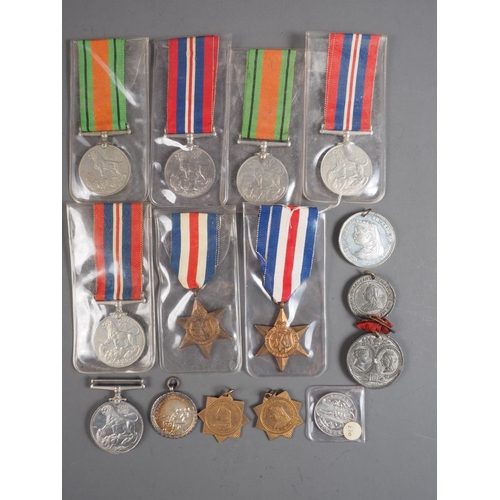 383 - Six 1939-1946 War medals,  two France and Germany Stars, five Victorian medallions, a Lewis Gunnery ... 