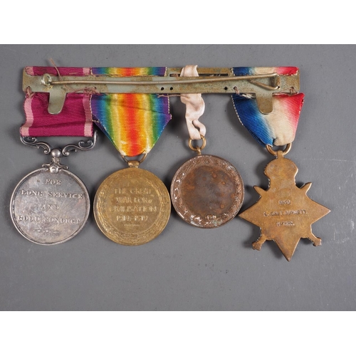 384 - A four-piece medal group, comprising a 1914-1915 Star, named 