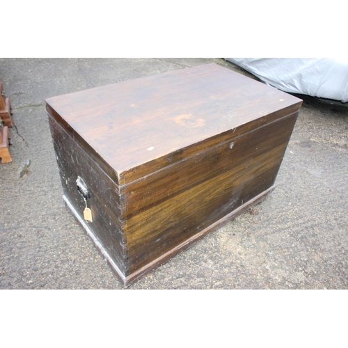 484 - A late 19th century camphor wood blanket chest with iron carry handles, 45