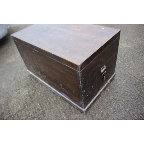 484 - A late 19th century camphor wood blanket chest with iron carry handles, 45