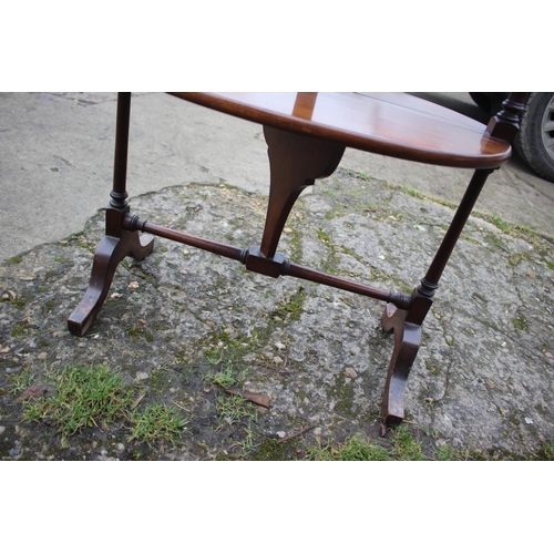 490 - A 19th century two-tier folding tea table, on splay supports, 20