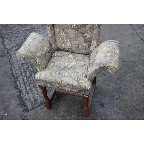 494 - A child's oak armchair of early 17th century design, upholstered in a Jacquard figured tapestry, on ... 