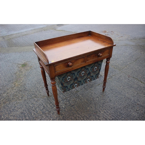 499 - A 19th century mahogany tray top work table, fitted two drawers over pull-out well, on turned suppor... 