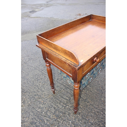 499 - A 19th century mahogany tray top work table, fitted two drawers over pull-out well, on turned suppor... 