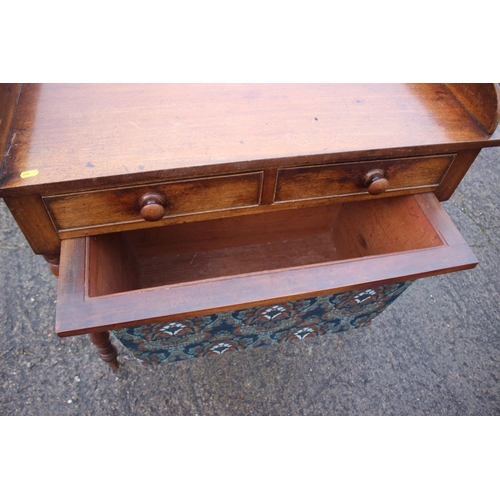 499 - A 19th century mahogany tray top work table, fitted two drawers over pull-out well, on turned suppor... 