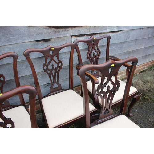 506 - A set of eight late 19th century mahogany dining chairs of Chippendale design with drop-in seats, on... 