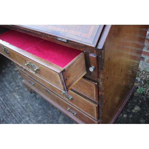 515 - A Georgian mahogany and vase inlaid fall front bureau with fitted interior over four long graduated ... 