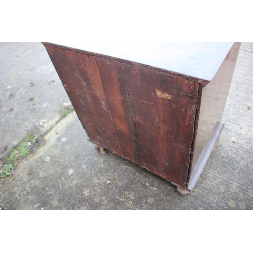 516 - A bachelor's early Georgian figured walnut and feather banded break bowfront chest of three long dra... 