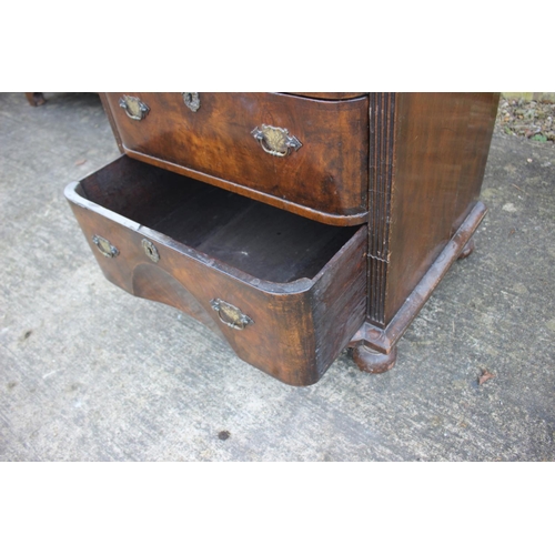 516 - A bachelor's early Georgian figured walnut and feather banded break bowfront chest of three long dra... 