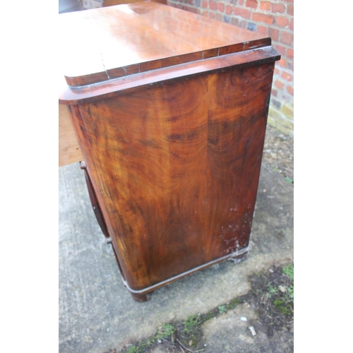 517 - A 19th century Continental figured mahogany commode chest of three drawers with shaped fronts, on br... 