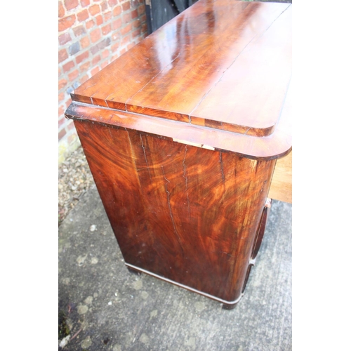 517 - A 19th century Continental figured mahogany commode chest of three drawers with shaped fronts, on br... 