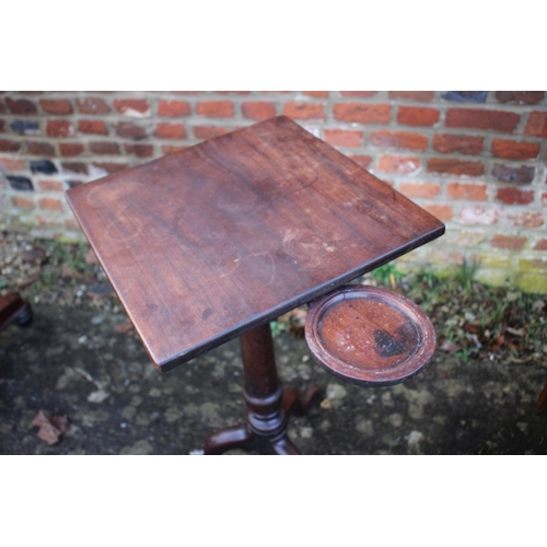 519 - A George III Cuban mahogany kettle stand with drip tray, on turned column, tripod splay support and ... 