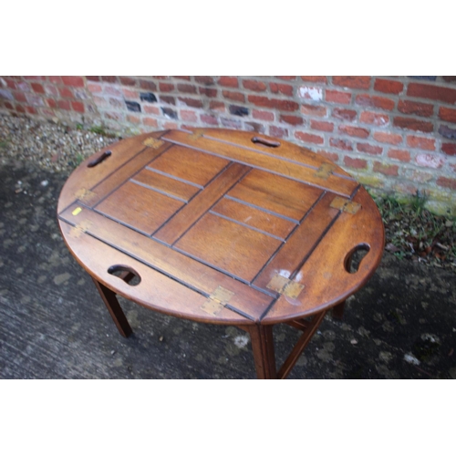 523 - A butler's mahogany folding tray, on stand, 20