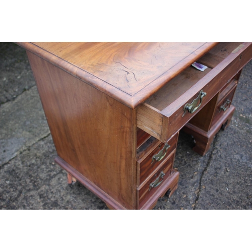 531 - A 19th century mahogany kneehole desk of Georgian design, fitted one long drawer over one small draw... 