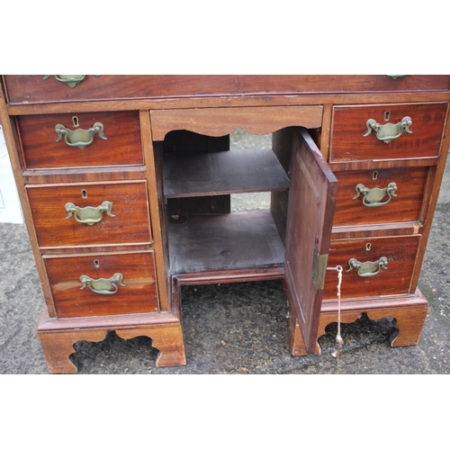 531 - A 19th century mahogany kneehole desk of Georgian design, fitted one long drawer over one small draw... 