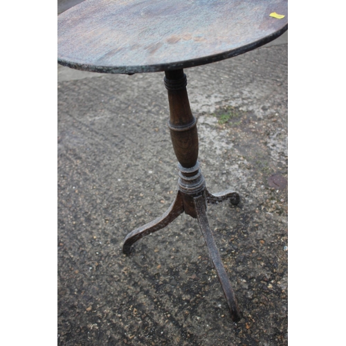 534 - A late Georgian provincial oak tilt top occasional table, on tapered splay supports, 18 1/2