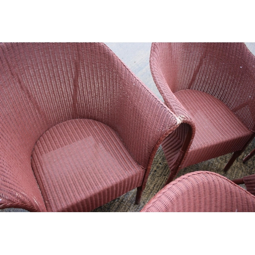 562 - Five 1940s Lloyd Loom armchairs with original 