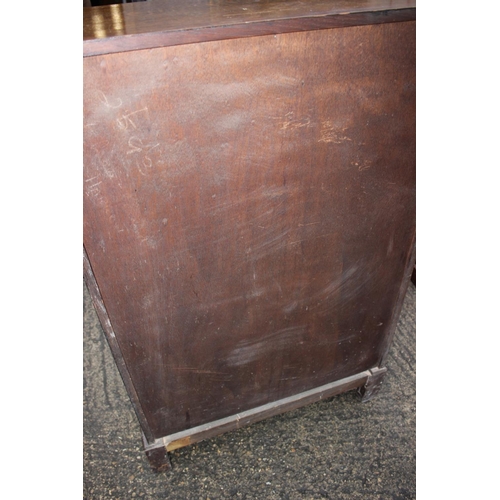 589 - A 1930s oak bookcase enclosed glazed panel doors, on bracket feet, 29