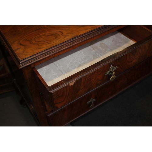 590 - A 1930s walnut chest of four long drawers, on cabriole supports, 36