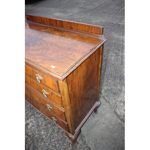 590 - A 1930s walnut chest of four long drawers, on cabriole supports, 36