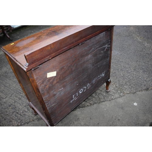 590 - A 1930s walnut chest of four long drawers, on cabriole supports, 36