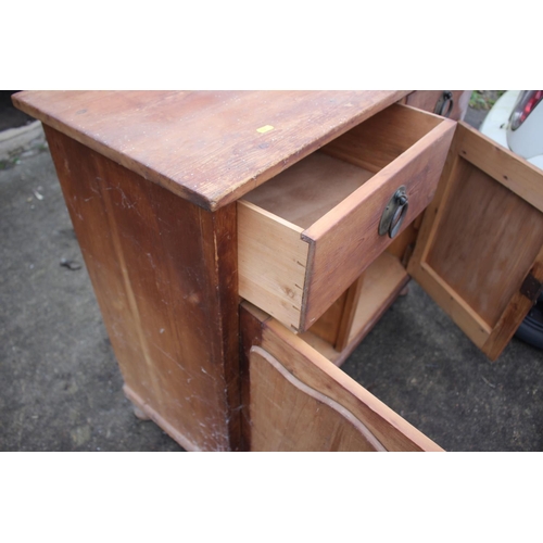 610 - A 19th century pine dresser base, fitted two drawers and cupboards, on stile supports, 42