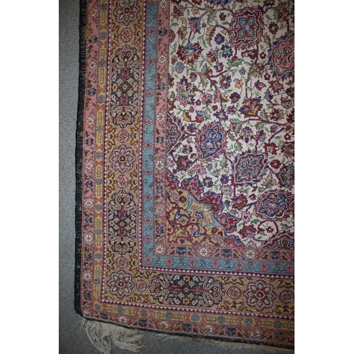 615 - An Isfahan silken pile rug with all-over floral figured design on a white ground and multi-borders i... 