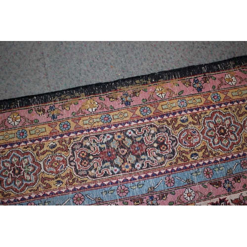 615 - An Isfahan silken pile rug with all-over floral figured design on a white ground and multi-borders i... 