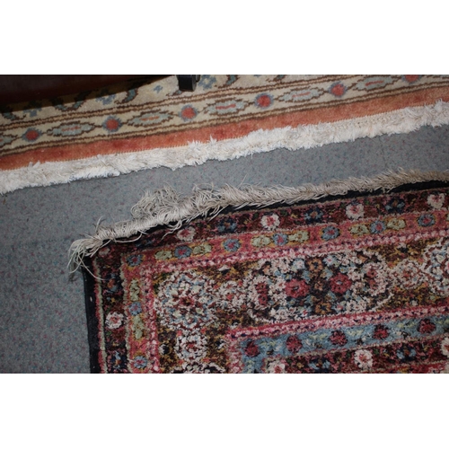 615 - An Isfahan silken pile rug with all-over floral figured design on a white ground and multi-borders i... 