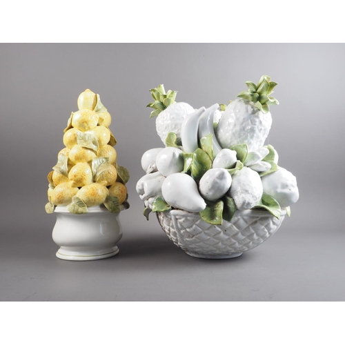 7 - A ceramic table centre, formed as a basket of fruit, 15