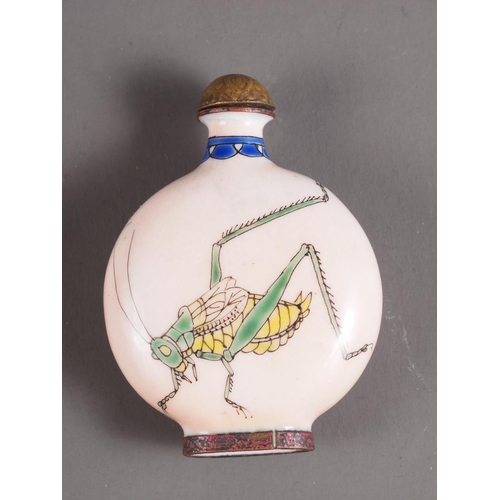 81 - A Chinese enamel on metal snuff bottle and stopper, with grasshopper and vegetable decoration, 2 3/8... 