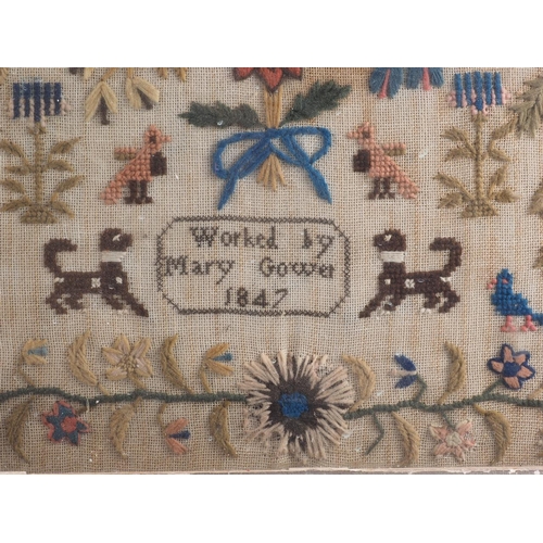 192 - A 19th century sampler with vase and flowers, worked by Mary Gower 1847, 18